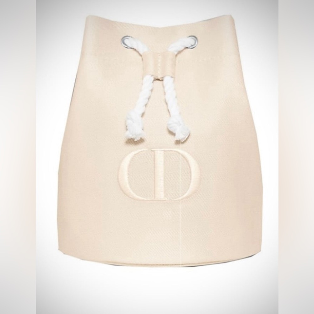 Dior creme & white drawstring beauty care bag